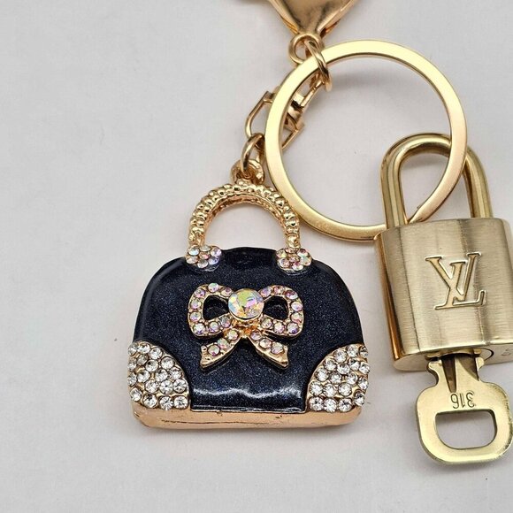 Authentic Louis Vuitton Lock & Key with unbranded Bagcharm  Authentic Louis Vuitton Lock & Key with unbranded Bagcharm, Keycharm, Keychain